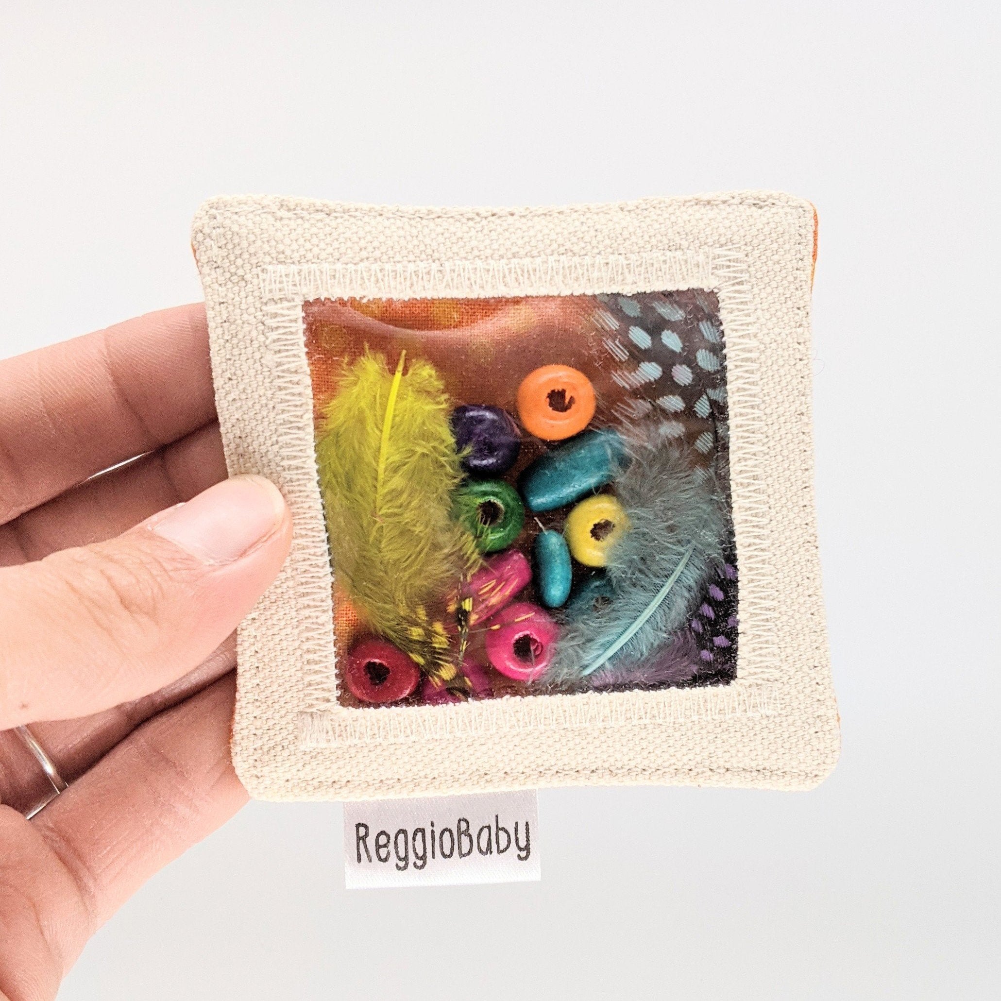 Mini Sensory Toy with Wood Beads and Feathers